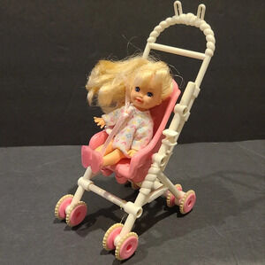 Mattel Barbie Kelly doll with stroller